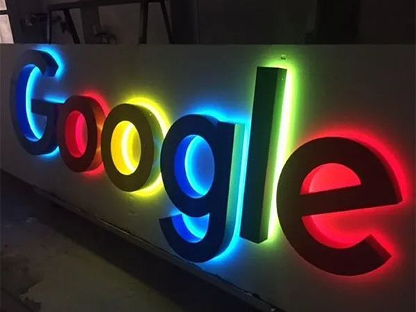 Multicolor illuminated channel letters spelling Google