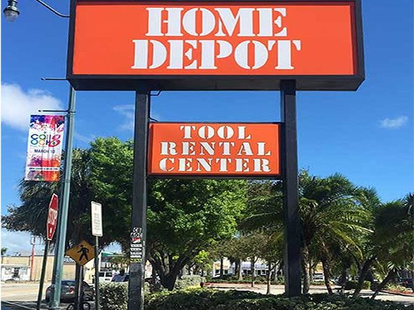 Home Depot lighted cabinet signs on a pole