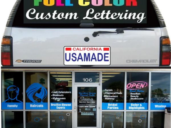 Full-color custom vinyl lettering on a truck’s rear window